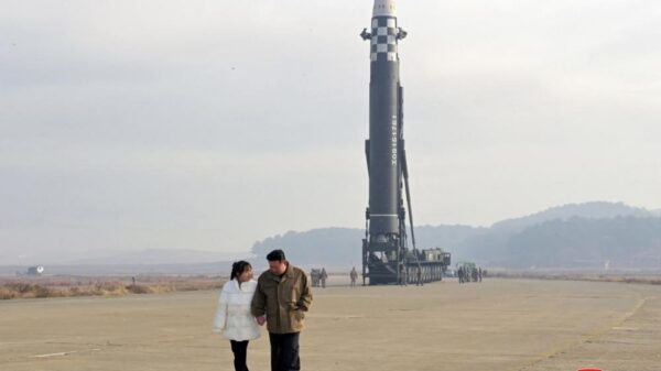 What indication is North Korean leader Kim Jong Un giving by presenting his daughter in front of the world
